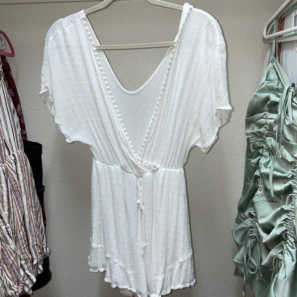 white romper with dot details